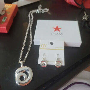 Silver tone necklace and earrings